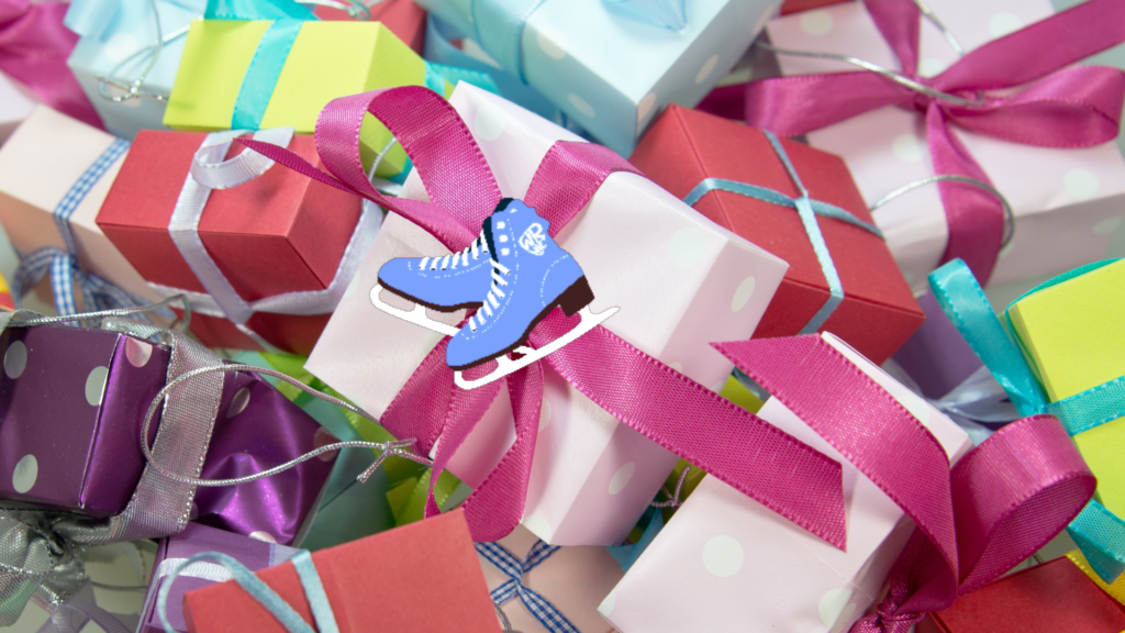 A pile of brightly wrapped birthday presents with ribbons, topped with a blue ice skate